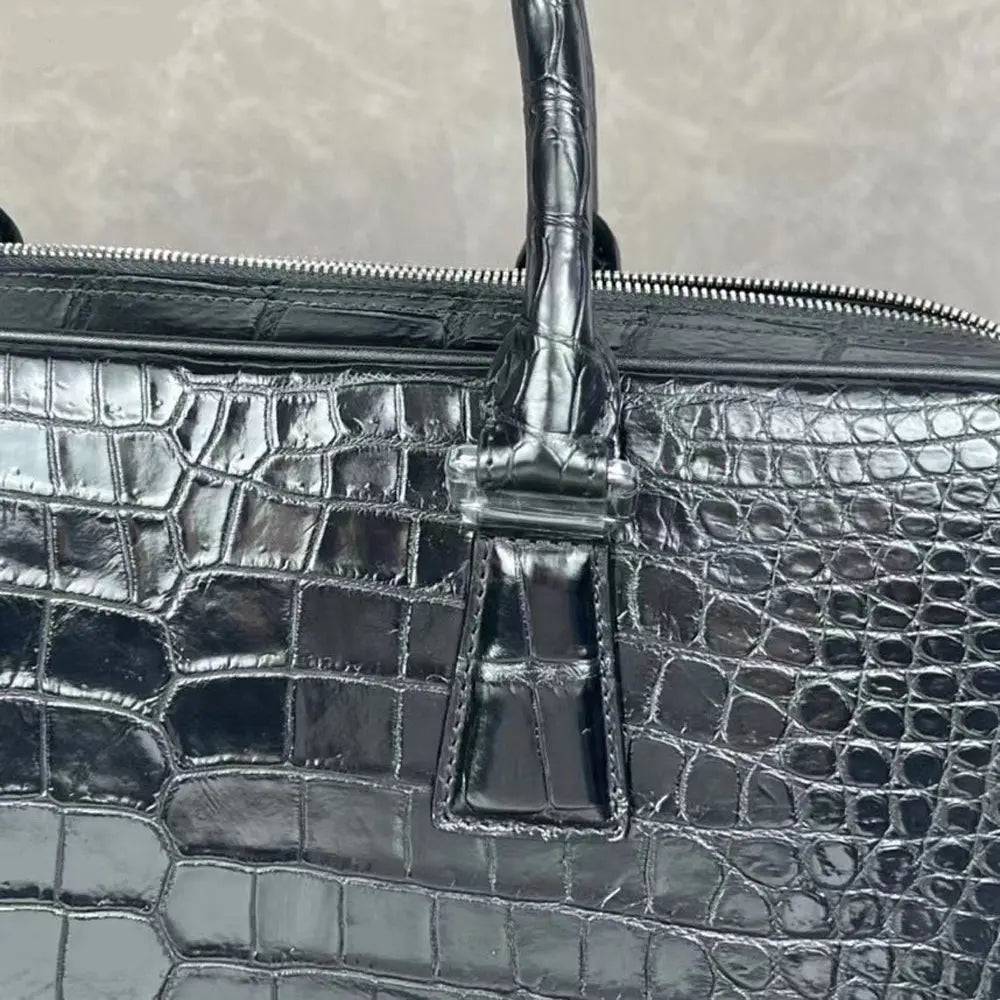 Rossie Viren crocodile leather laptop briefcase with a secure combination lock, featuring a sleek, professional handbag design.