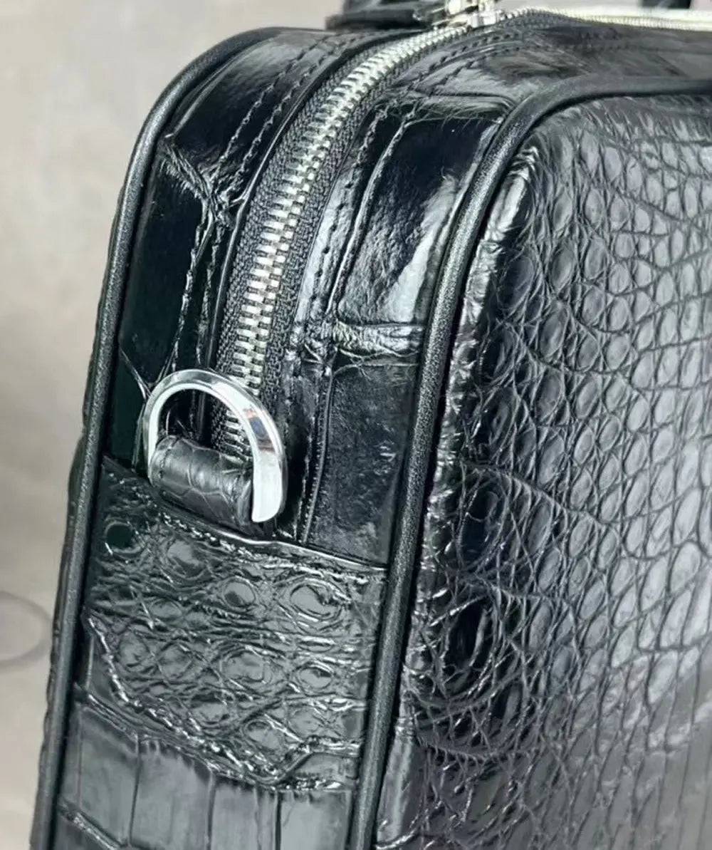Rossie Viren crocodile leather laptop briefcase with combination lock, featuring a sleek, textured crocodile pattern and secure closure.