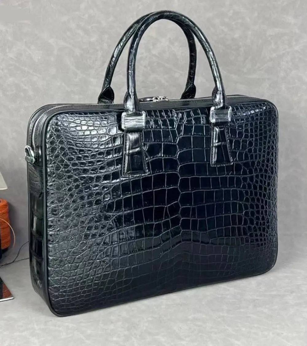 Rossie Viren crocodile leather laptop briefcase with combination lock, featuring a sleek, professional handbag design.