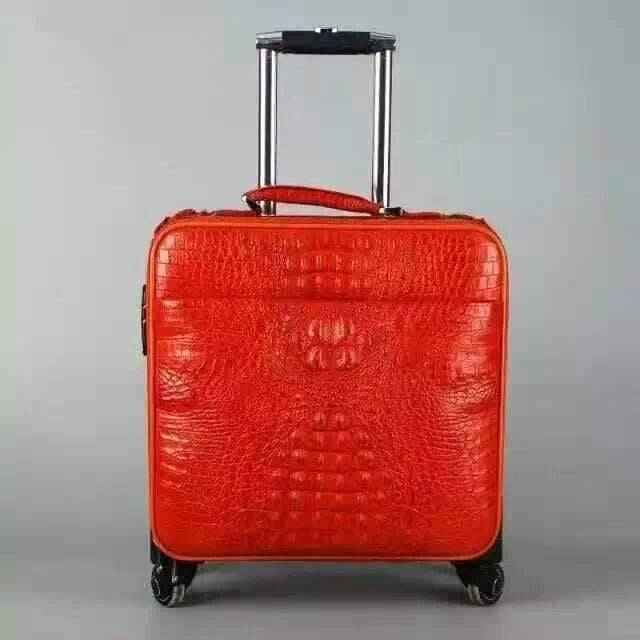 Rossie Viren crocodile leather luggage trolley case with a sleek crocodile pattern, durable handle, and secure clasps.