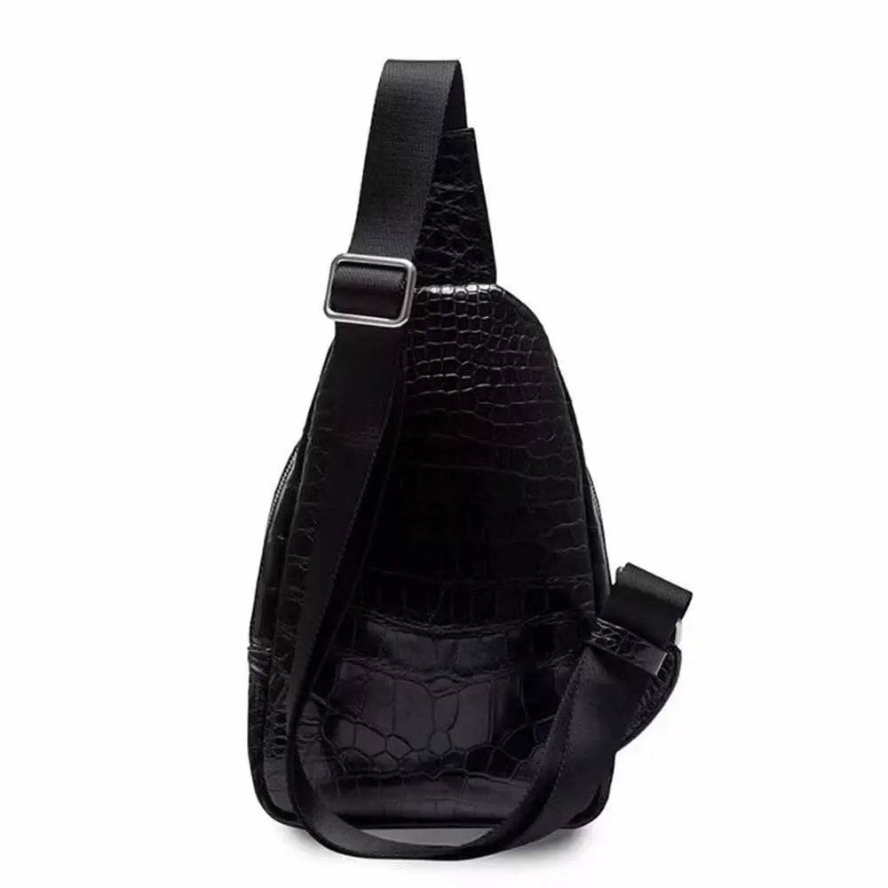 Crocodile leather men's sling chest bag by Rossie Viren, featuring a messenger-style shoulder bag for travel and hiking.