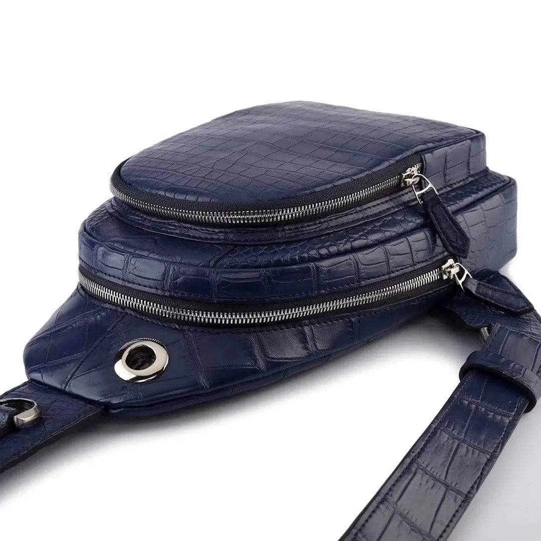 Crocodile leather men's sling chest bag by Rossie Viren, showing a stylish messenger shoulder travel hiking handbag with a textured crocodile pattern.