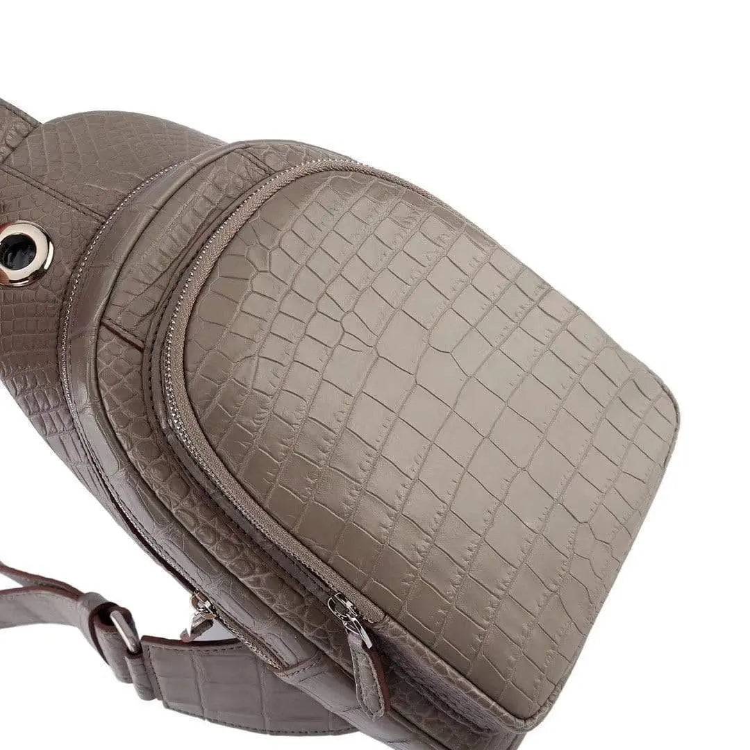 Rossie Viren crocodile leather men's sling chest bag with shoulder strap, ideal for travel, hiking, and daily use.