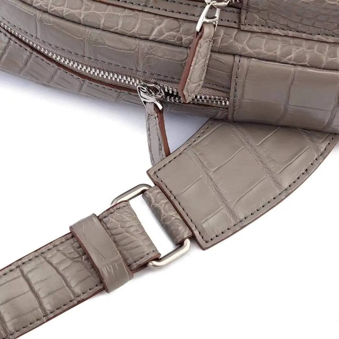 Crocodile leather men's sling chest bag by Rossie Viren, featuring a sleek messenger style for travel, hiking, and everyday use.