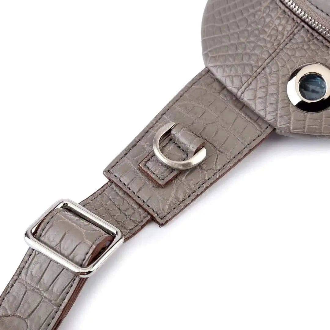 Rossie Viren crocodile leather men's sling chest bag with adjustable shoulder strap and multiple compartments for travel and hiking.