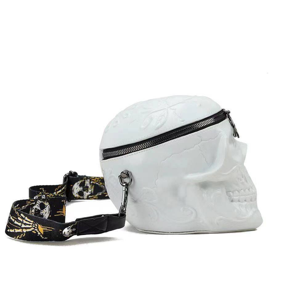 Small white 3D skull messenger shoulder handbag by Rossie Viren, featuring a bold skull design and compact, stylish shape.