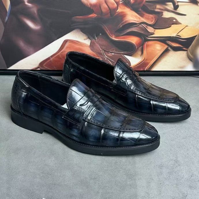 Dark grey vintage crocodile leather loafer shoes by Rossie Viren, showcasing textured crocodile pattern and classic slip-on style.