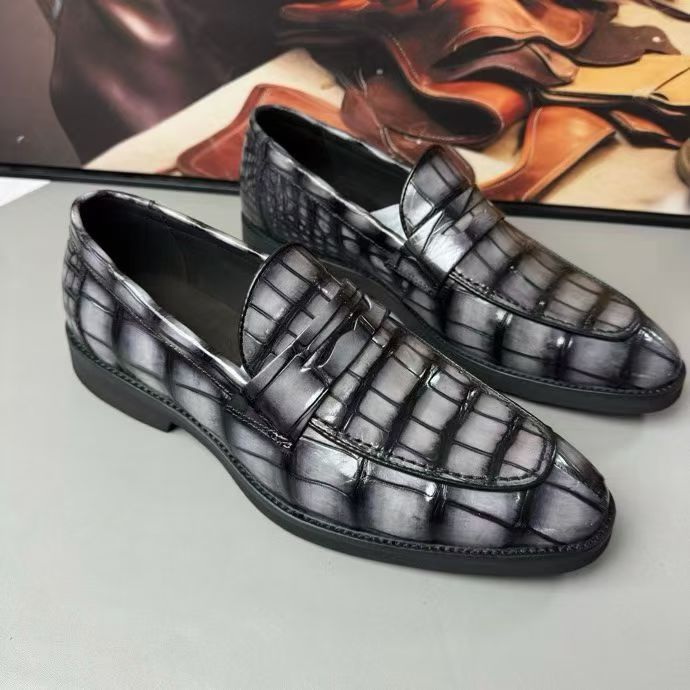 Vintage grey crocodile leather loafer shoes by Rossie Viren, showcasing textured crocodile pattern and classic slip-on style.