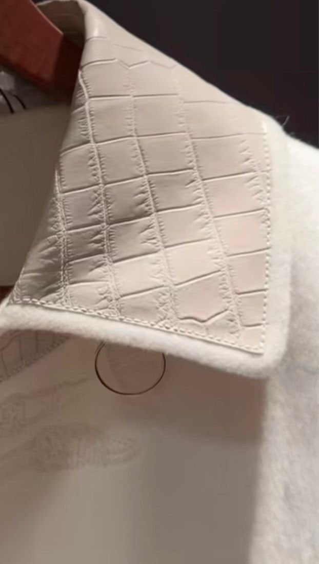 Men's cashmere jacket with crocodile skin leather by Rossie Viren, showcasing the luxurious collar and textured leather details.