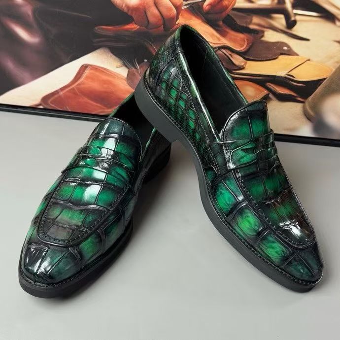 Vintage green crocodile leather loafers by Rossie Viren, showcasing detailed crocodile texture and classic slip-on design.