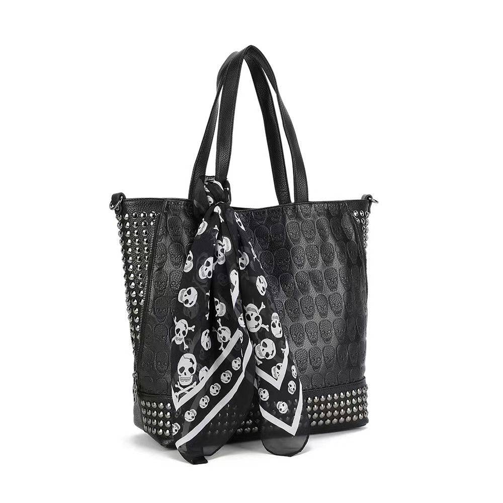 Large 3D shopper bag by Rossie Viren featuring studded embossed skull design, small pouch, and matching scarf.