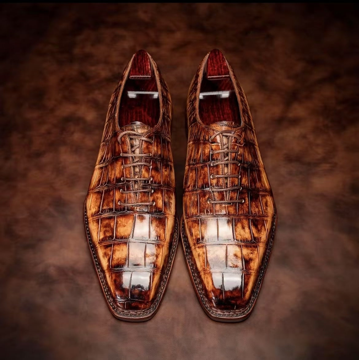 Crocodile leather Norwegian sewn lace-up dress shoes by Rossie Viren featuring detailed crocodile texture and polished finish.