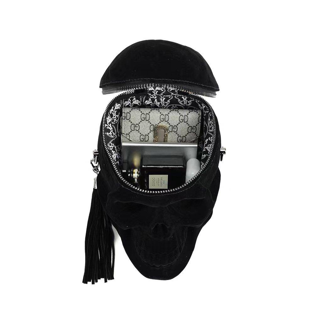 Black suede 3D skull crossbody shoulder bag by Rossie Viren with mini handle, stylish handle bag for casual and edgy looks.