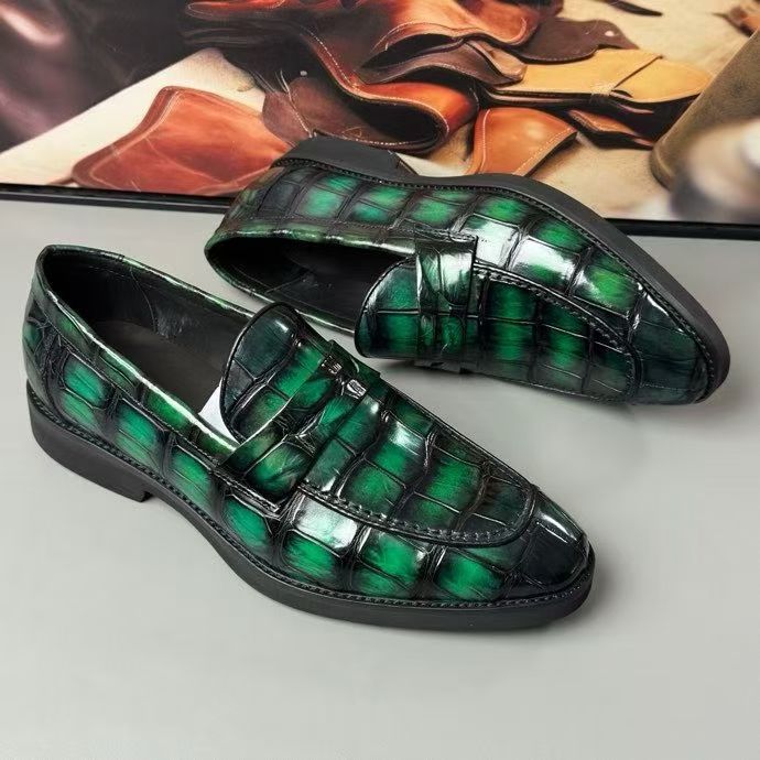 Vintage green crocodile leather loafer shoes by Rossie Viren, showcasing detailed crocodile texture and classic slip-on style.
