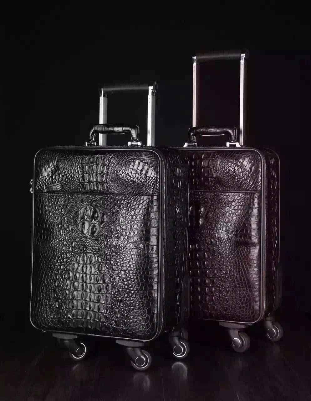 Genuine crocodile leather laptop trolley suitcase by Rossie Viren with sturdy wheels and handle for travel luggage and storage.