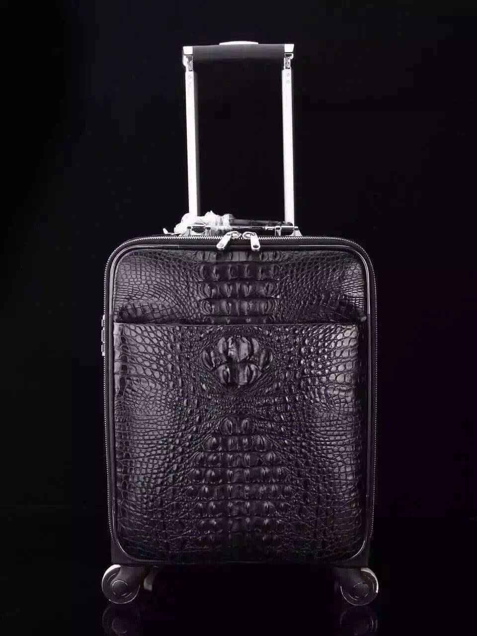 Genuine crocodile leather laptop trolley luggage case by Rossie Viren with sturdy wheels and handle for travel.