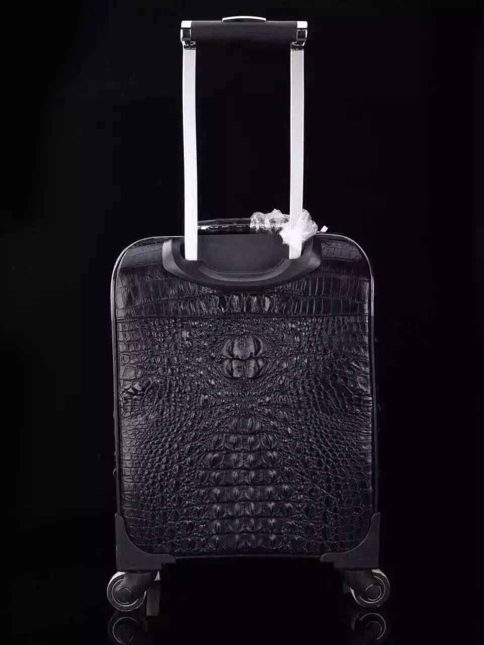 Genuine crocodile leather laptop trolley luggage case by Rossie Viren with sturdy wheels and handle for travel and business trips.