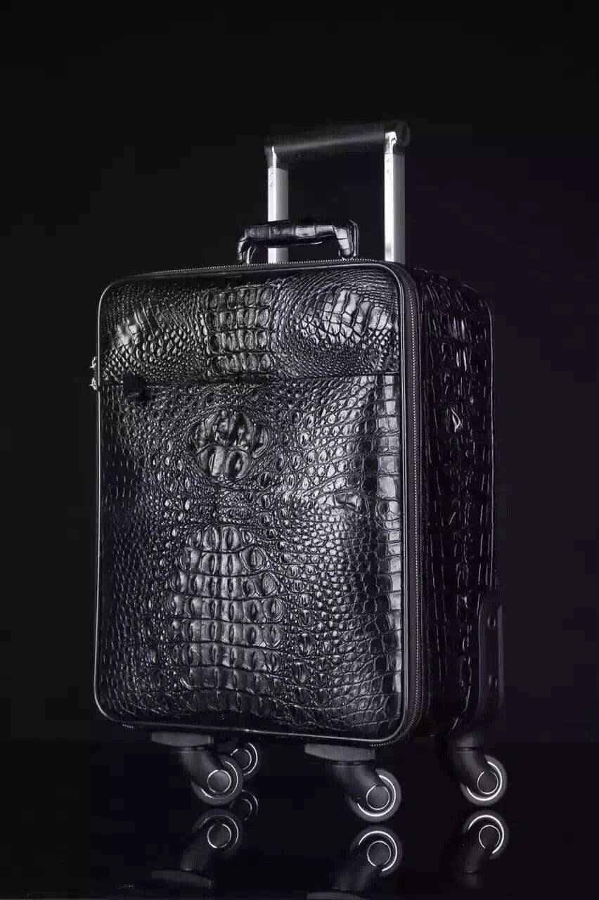Genuine crocodile leather Rossie Viren laptop trolley luggage case with sturdy wheels and handle, designed for travel and protection.