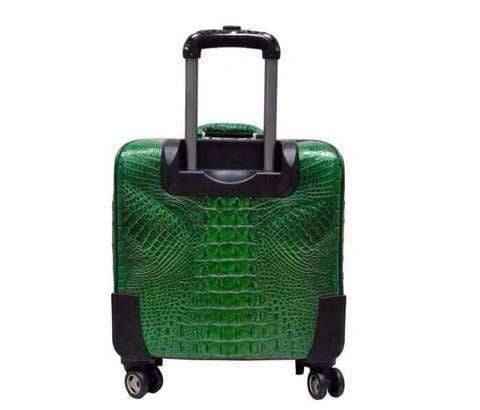 Genuine crocodile leather luxury suitcase with roller bag design from Rossie Viren, featuring a polished crocodile pattern and sturdy handle.