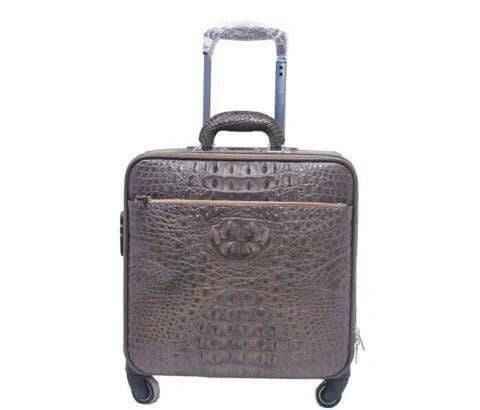 Genuine crocodile leather luxury roller luggage bag by Rossie Viren with sturdy handle and sleek design.