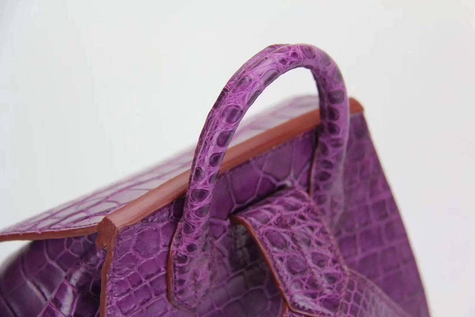 Genuine crocodile belly leather backpack handbag by Rossie Viren, featuring a sleek design and textured crocodile pattern.