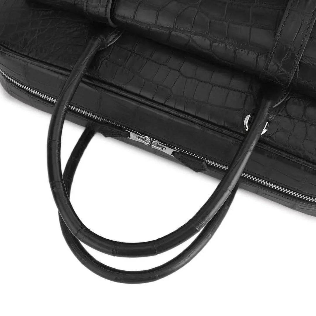 Black genuine crocodile leather messenger bag for men, designed for business documents, travel, and laptop carrying by Rossie Viren.