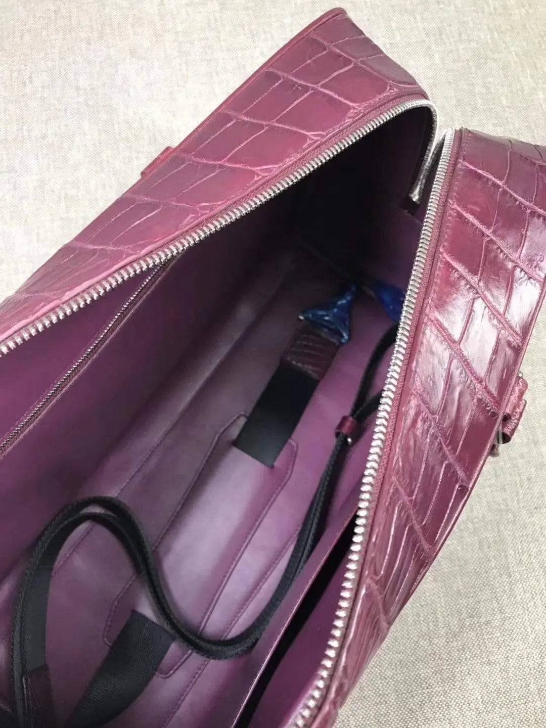 Rossie Viren genuine crocodile leather large travel bag, bone leather weekend holdall with spacious interior and durable design.