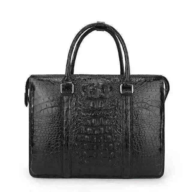 Genuine crocodile leather briefcase handbag by Rossie Viren with a sleek, textured surface and sturdy handles.