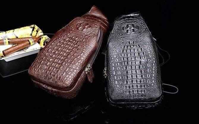 Genuine crocodile leather men's sling chest bag by Rossie Viren, featuring a textured crocodile pattern and adjustable strap.