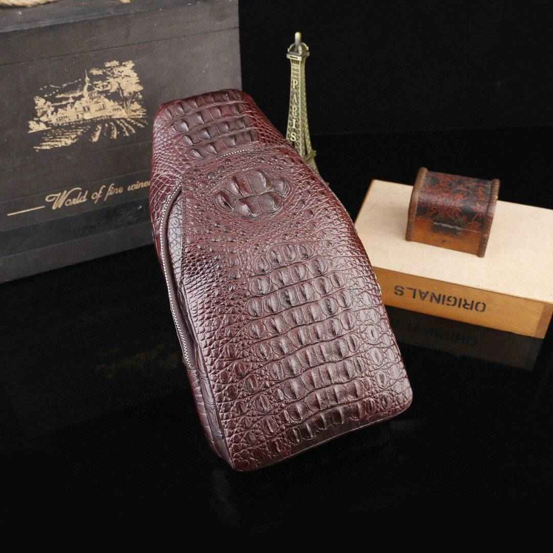 Genuine crocodile leather men's sling chest bag with adjustable strap and sleek design, by Rossie Viren.
