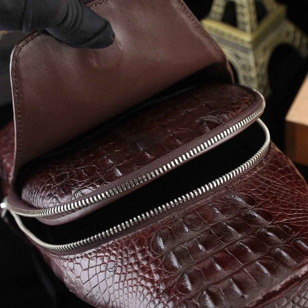Genuine crocodile leather men's sling chest bag with adjustable strap and sleek design, by Rossie Viren.