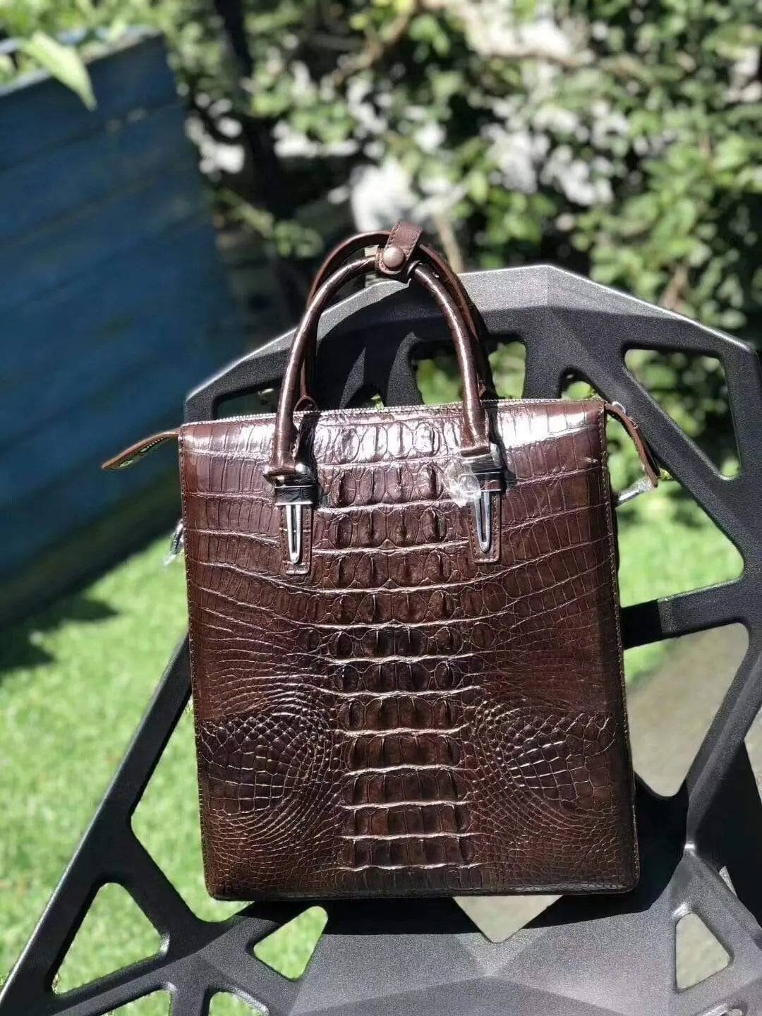Genuine crocodile leather vertical men's briefcase handbag by Rossie Viren, showcasing sleek design and textured crocodile pattern.