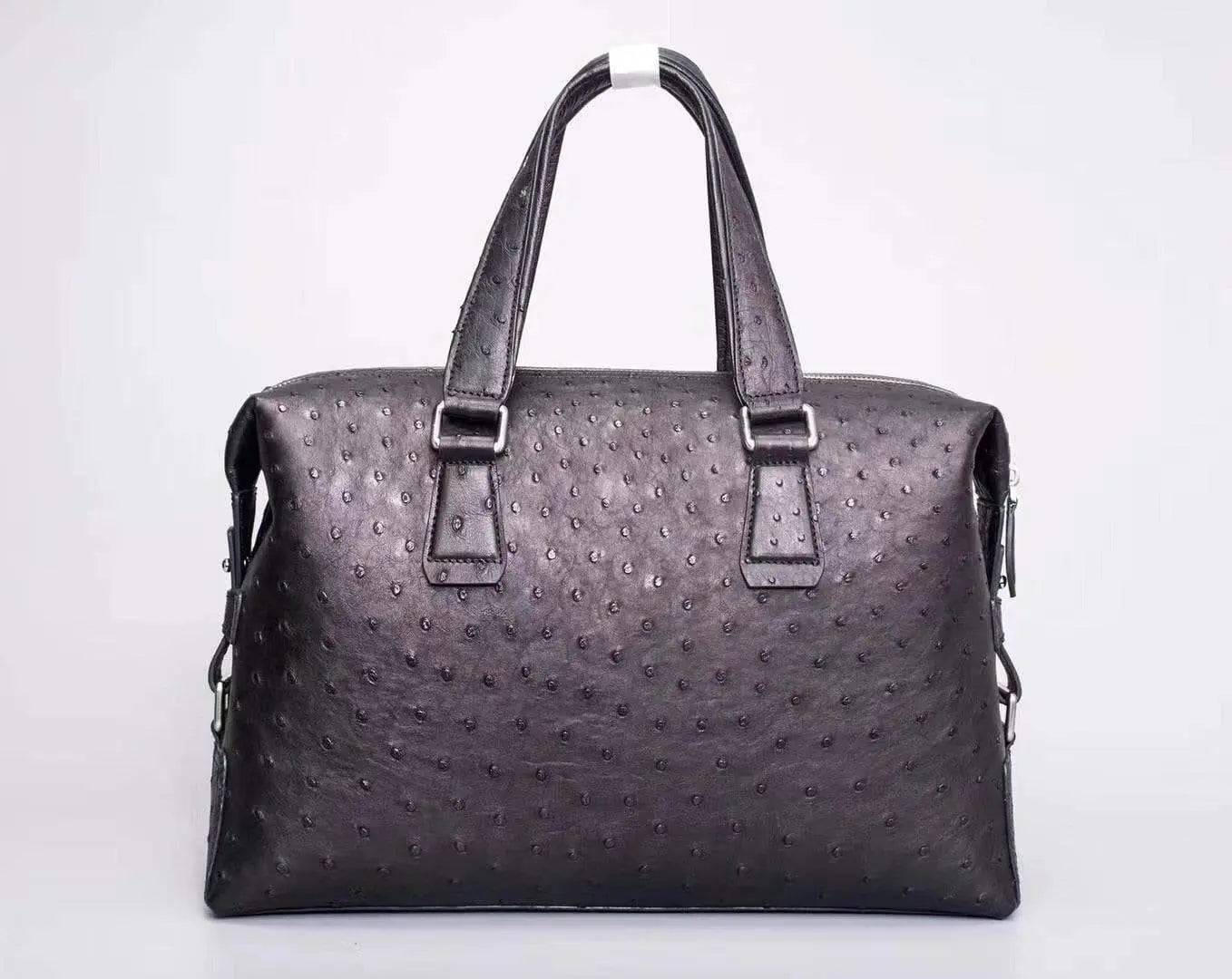 Black Rossie Viren genuine ostrich leather briefcase tote bag with textured surface and sturdy handles.