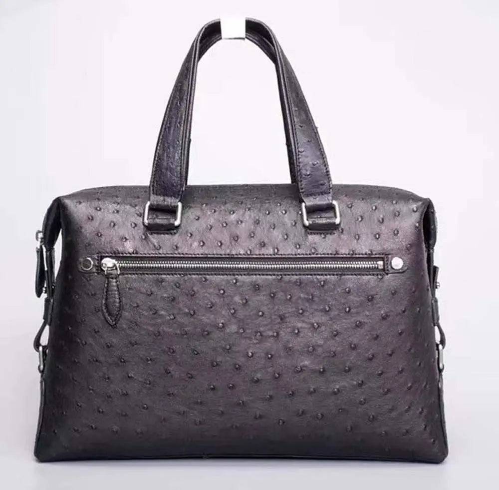 Black genuine ostrich leather briefcase tote bag by Rossie Viren, featuring a sleek design with textured ostrich leather surface.