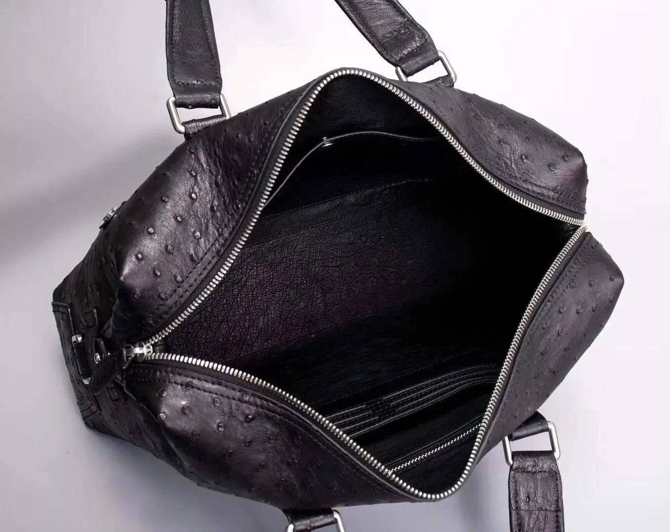 Genuine black ostrich leather briefcase tote bag by Rossie Viren, featuring a sleek design and textured leather surface.
