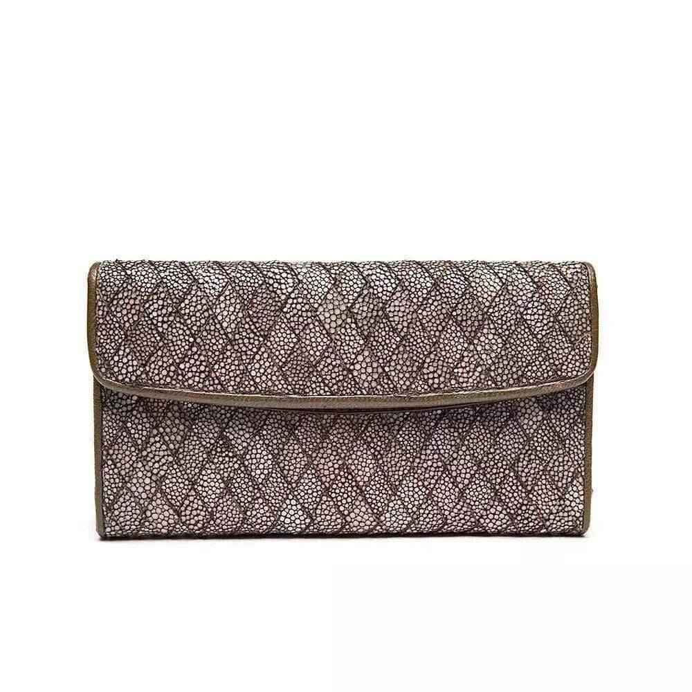 Genuine stingray leather large flap wallet for women by Rossie Viren, featuring textured surface and spacious interior.
