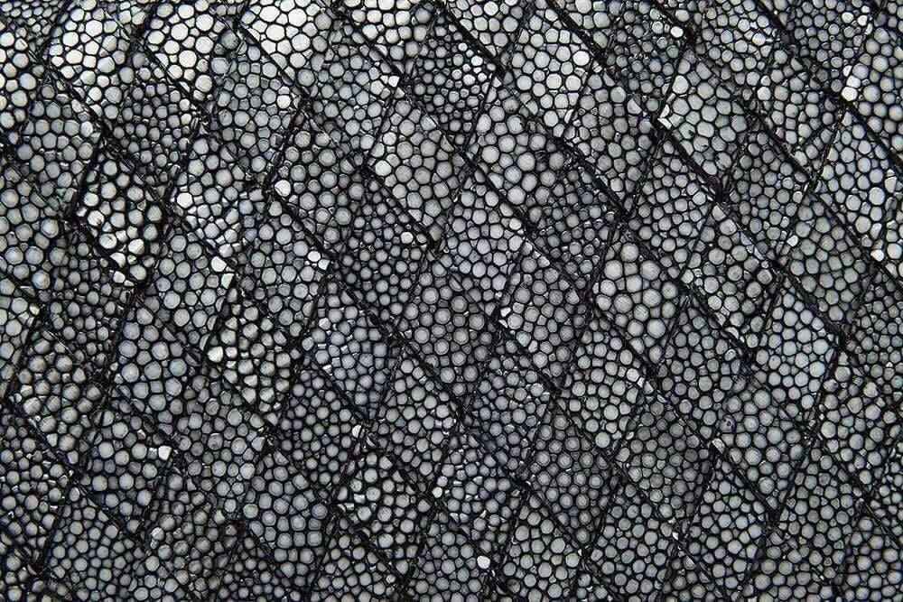 Genuine stingray leather large flap wallet for women by Rossie Viren, featuring textured surface and elegant design.