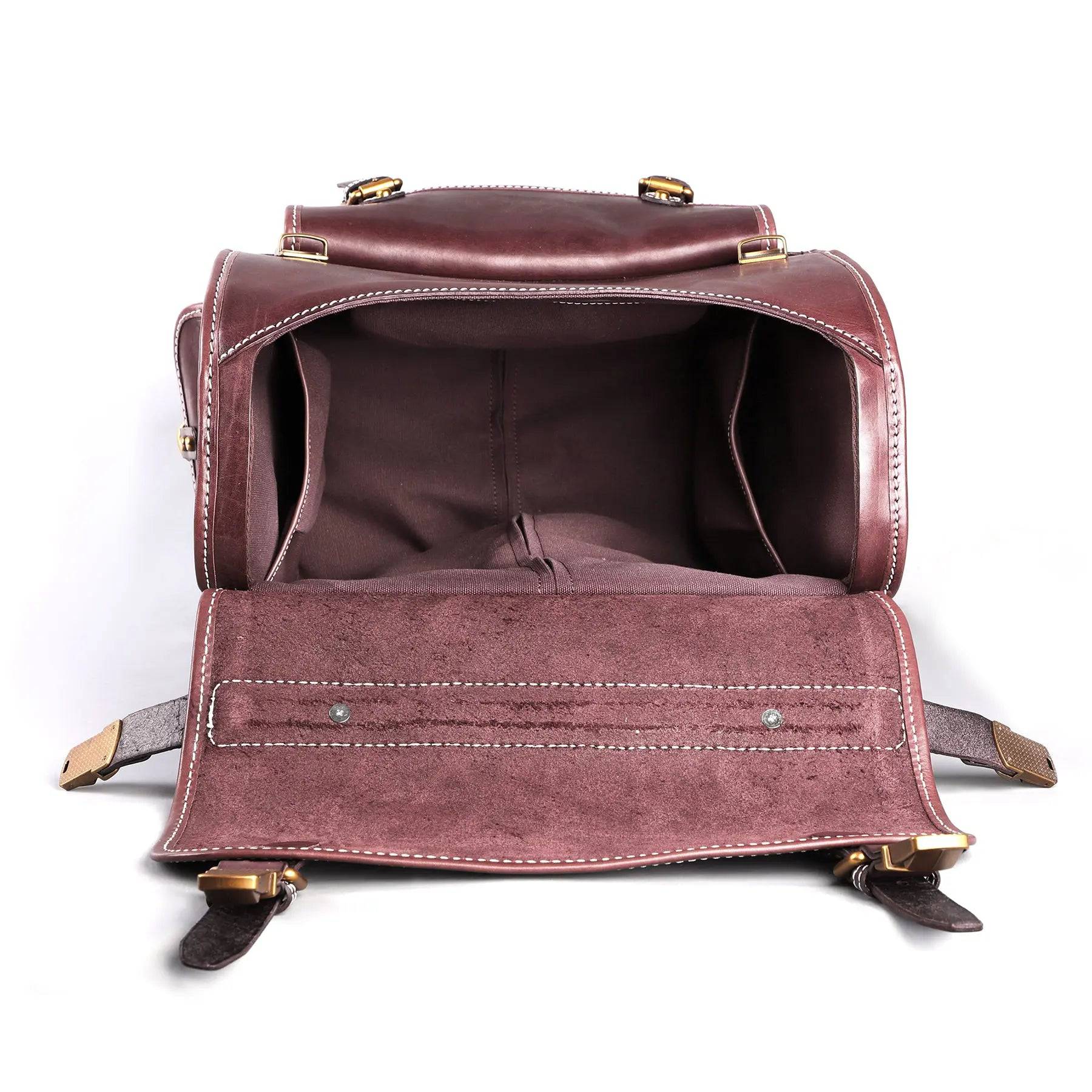 Vintage vegetable-tanned leather rolling suitcase with universal wheels, 23-inch carry-on business trolley bag by Rossie Viren.