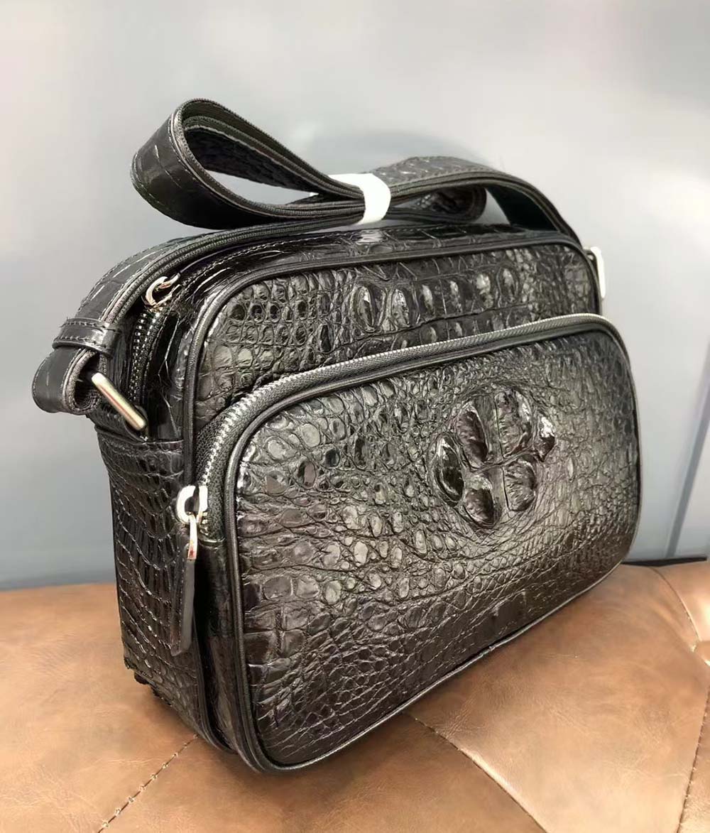Rossie Viren crocodile leather cross body shoulder bag showing textured crocodile pattern and sleek handbag design.