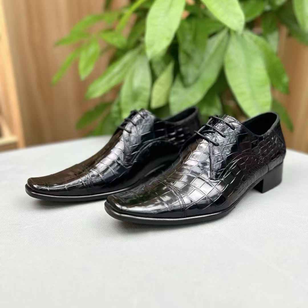 Men's black crocodile leather lace-up shoes by Rossie Viren, showcasing the textured crocodile pattern and polished finish.