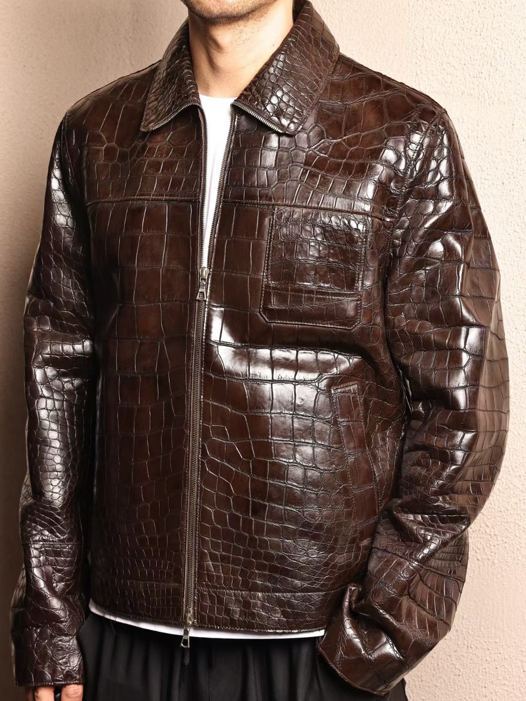 Men's brown crocodile skin leather jacket by Rossie Viren, showcasing the textured crocodile pattern and stylish collar design.