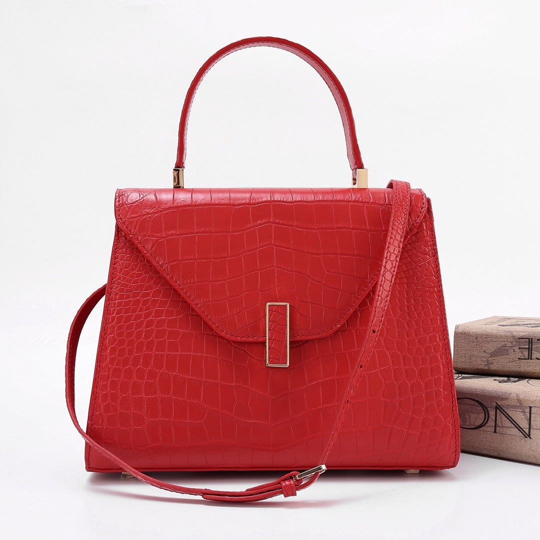 Red genuine crocodile skin leather top handle bag by Rossie Viren, featuring a sleek design and elegant top handle.
