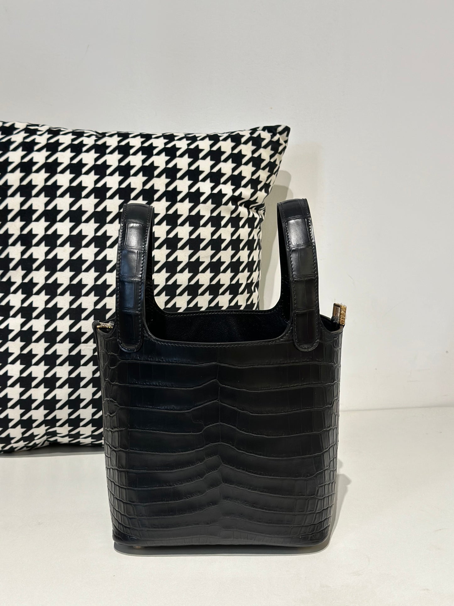Black women's Rossie Viren genuine crocodile leather crossbody handbag with small size and sleek design.