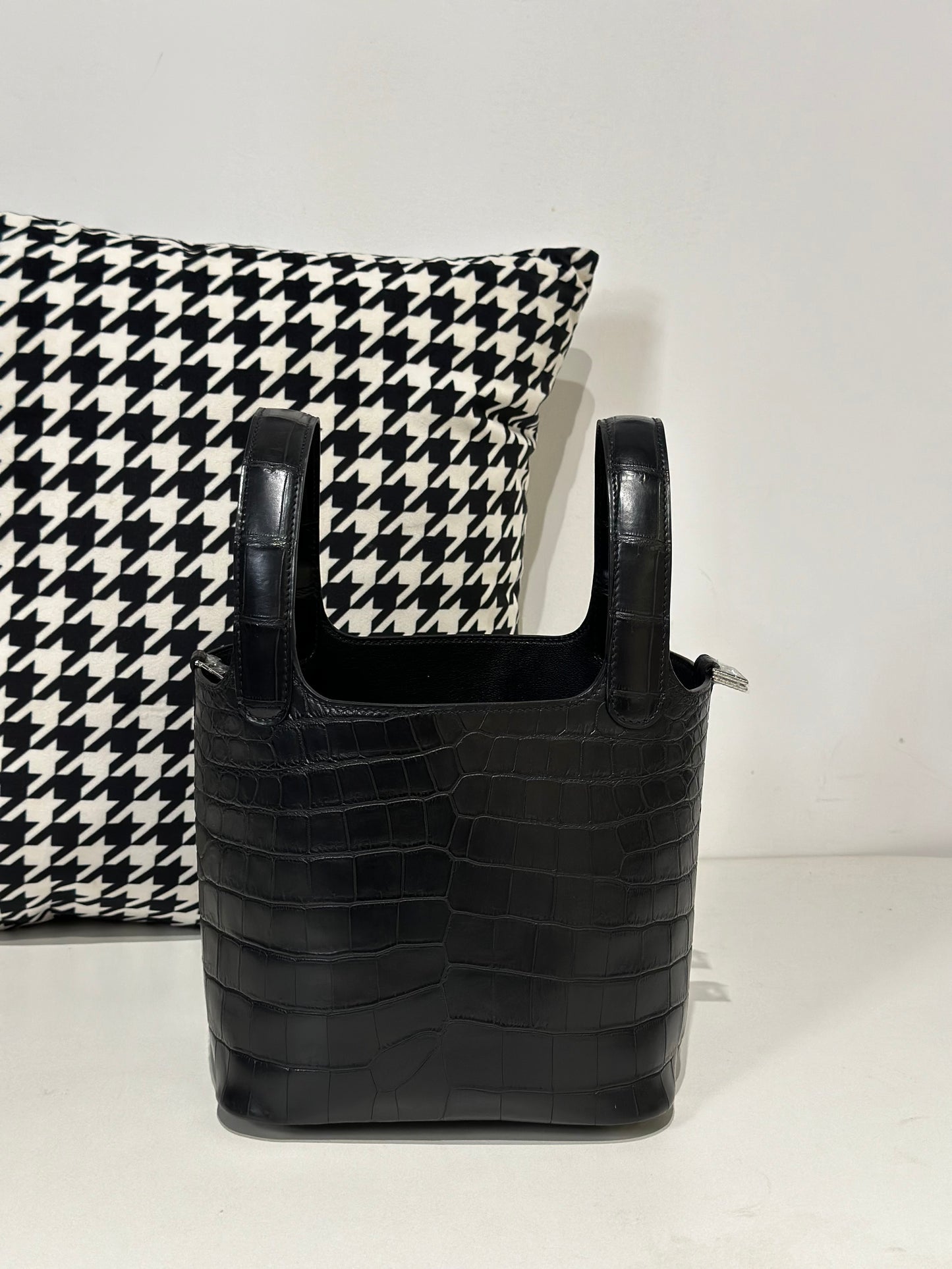 Black women's Rossie Viren genuine crocodile leather crossbody handbag with a sleek, compact design and adjustable strap.