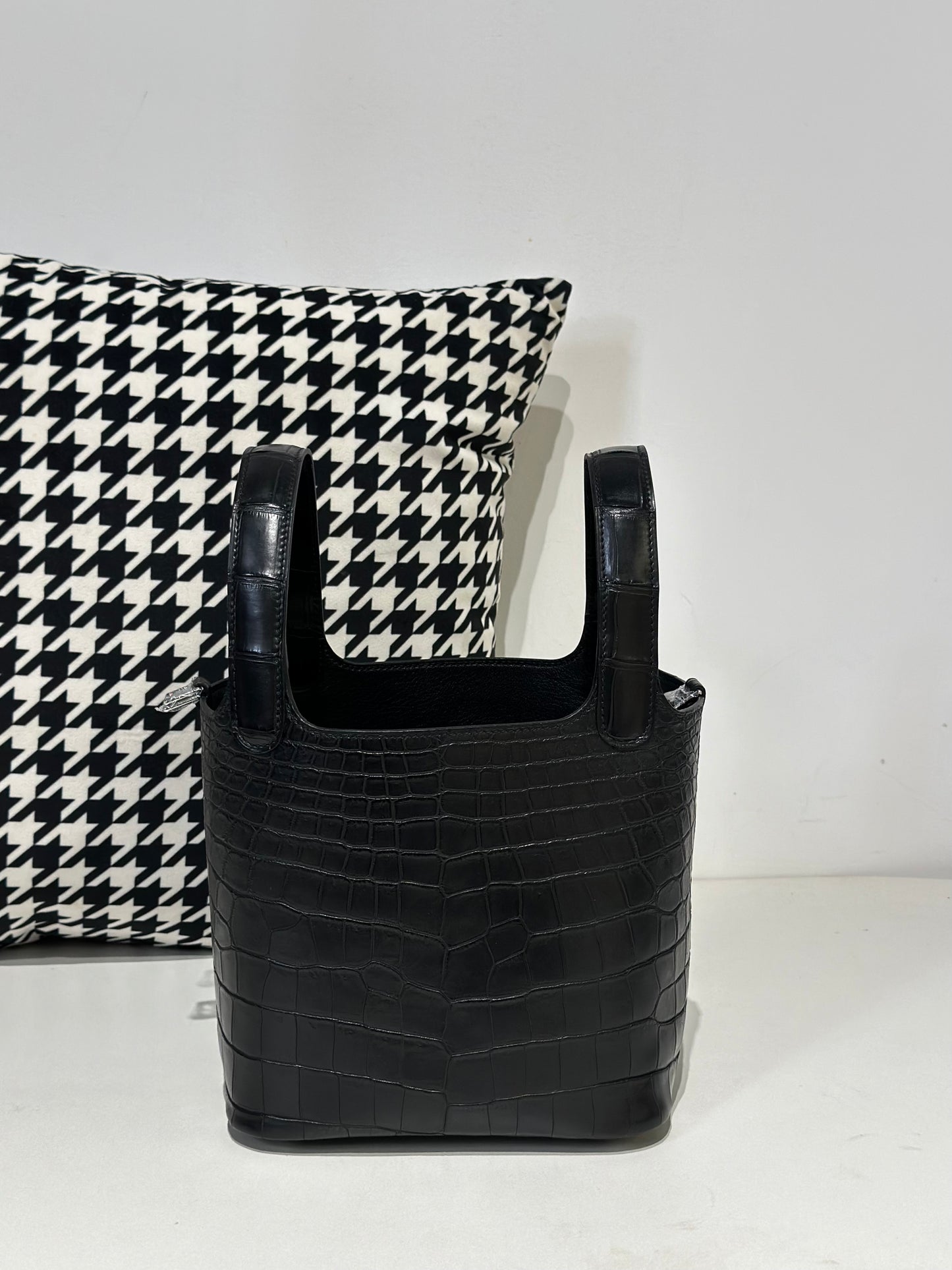 Women's black genuine crocodile leather cross body handbag by Rossie Viren, compact design with textured crocodile skin finish.