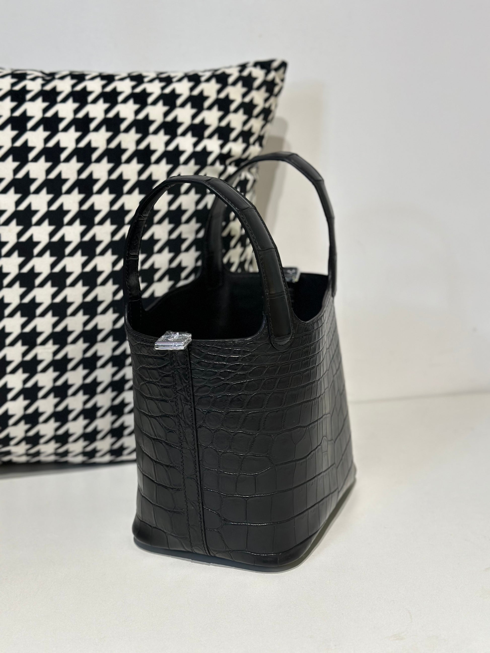Black women's Rossie Viren genuine crocodile leather crossbody handbag with a sleek, compact design and adjustable strap.