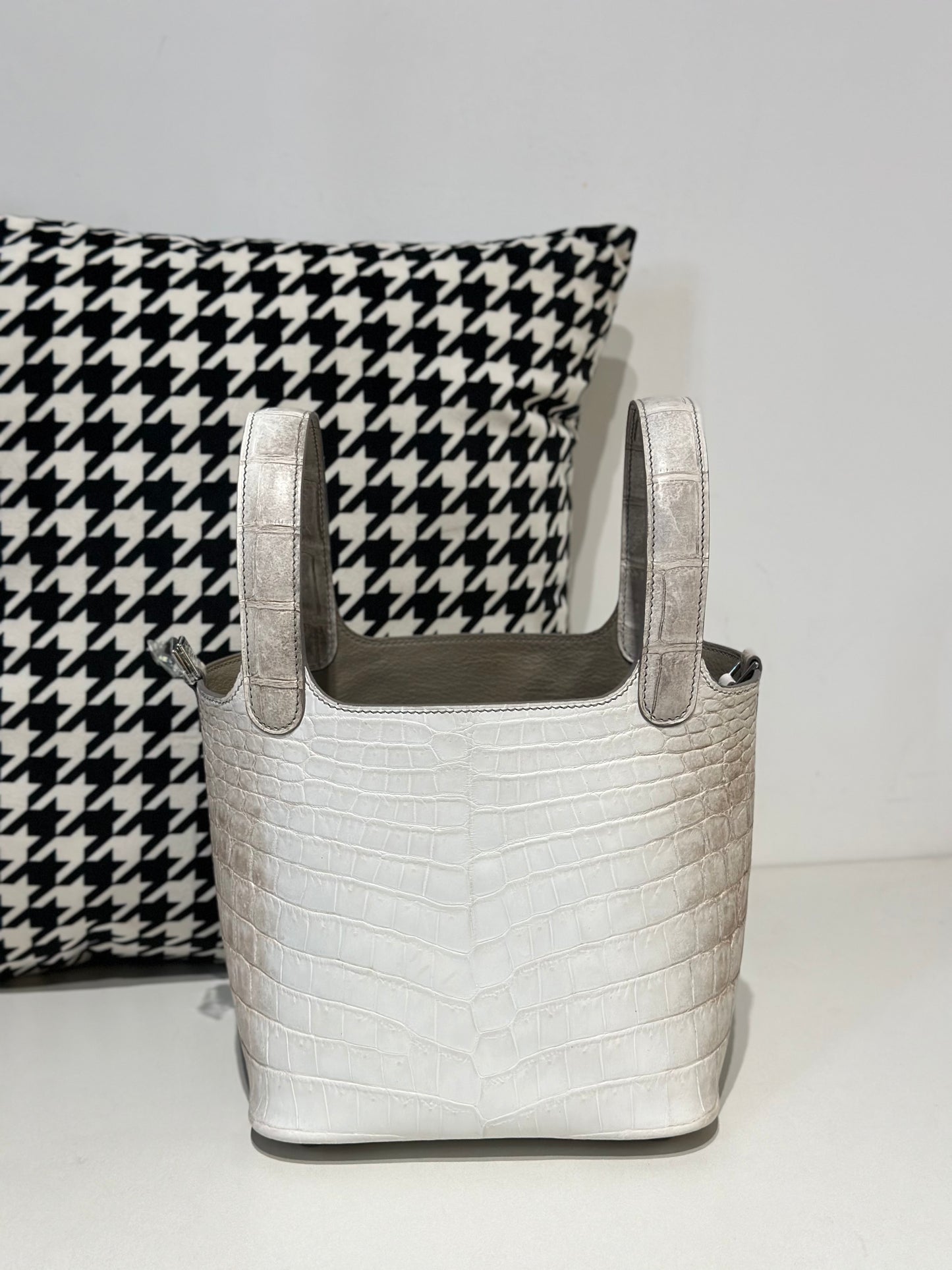 Women's genuine crocodile skin leather small crossbody handbag by Rossie Viren, showcasing a sleek Himalayan-colored design.