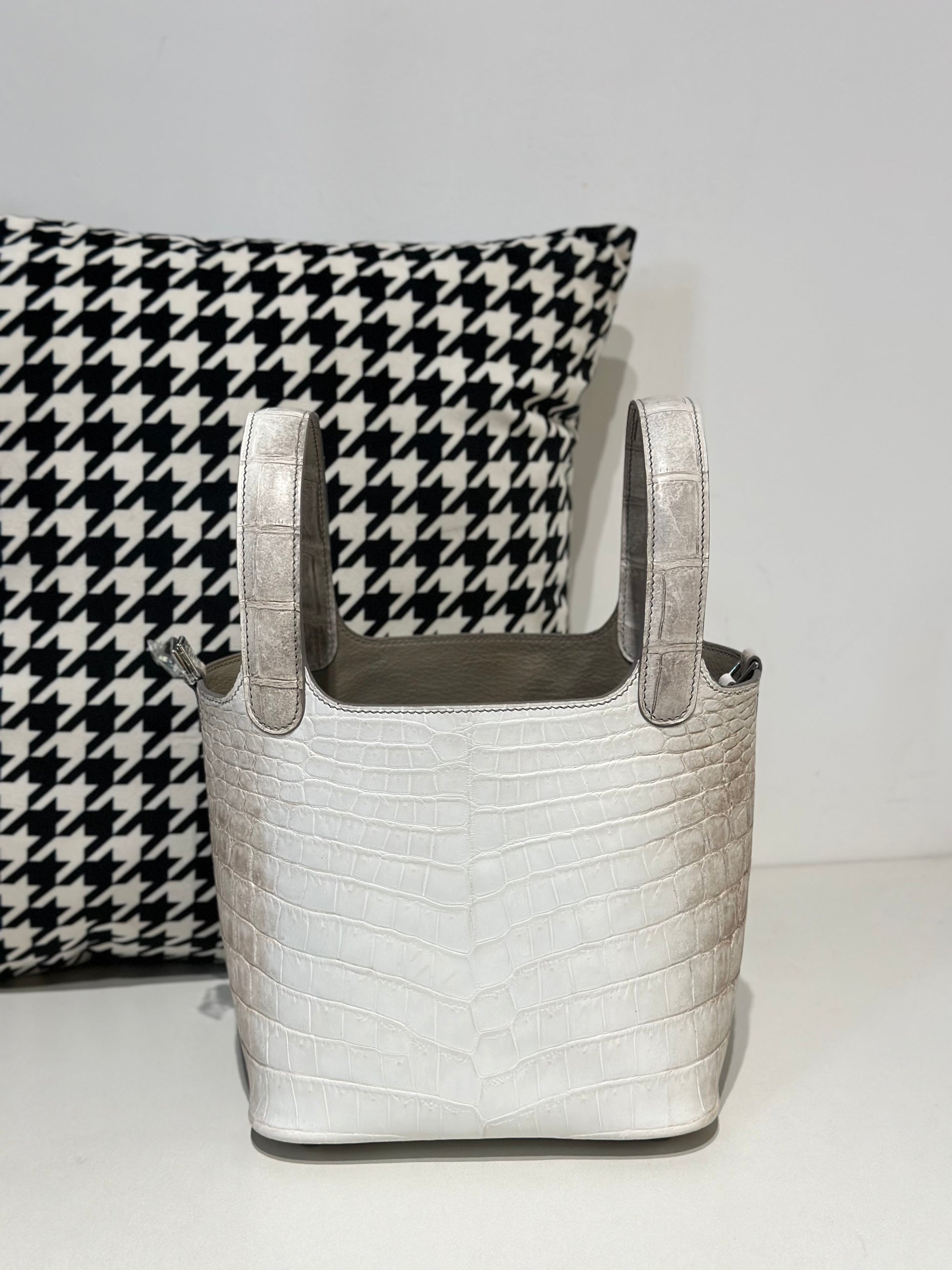 Women's genuine crocodile skin leather small crossbody handbag by Rossie Viren, showcasing a sleek Himalayan-colored design.