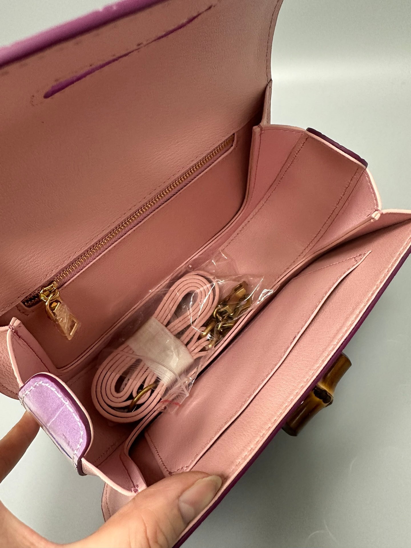 Rossie Viren brushed crocodile skin leather bamboo top handle crossbody handbag with elegant design and textured finish.