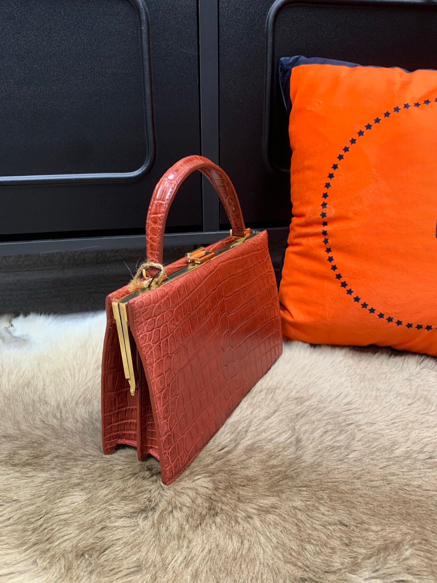 Rossie Viren crocodile leather evening clutch bag with top handle and elegant design, perfect for formal occasions.
